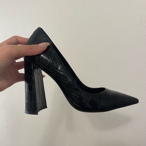 Black pointed toe heels